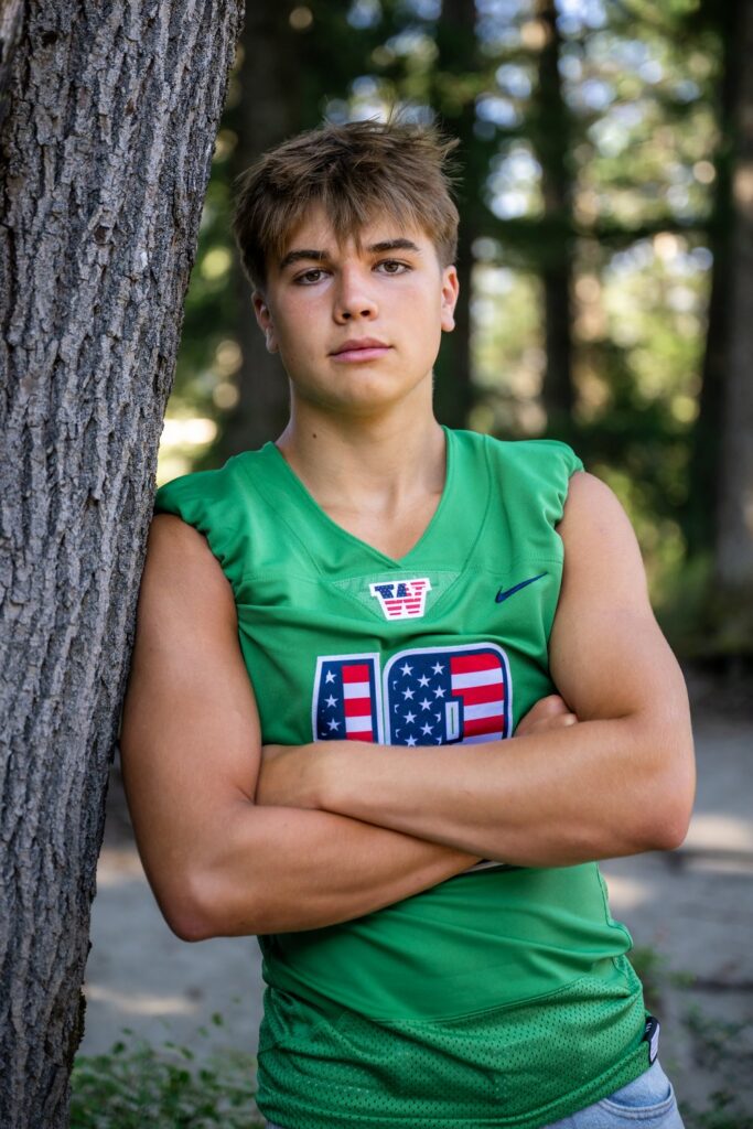 woodinville high school boy in football jersey