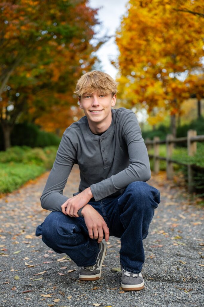 fall leaves bellevue botanical garden high school senior guy