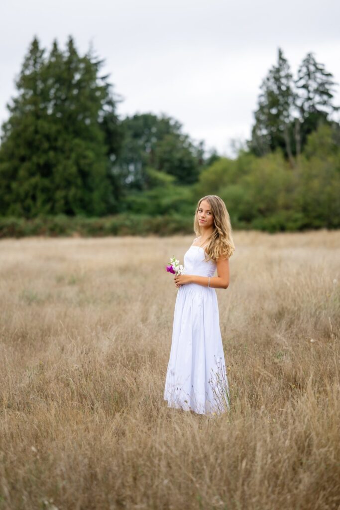 discovery park open field senior in long white dress