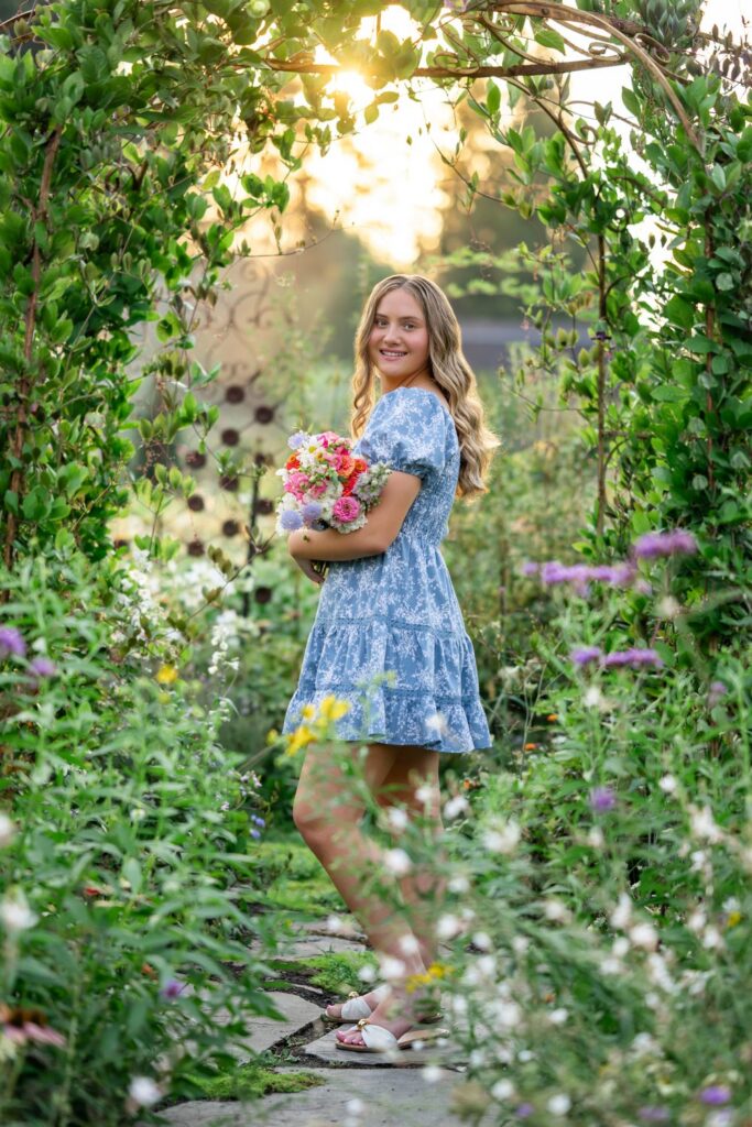 snohomish flower farm high school senior in blue dress with bouquet