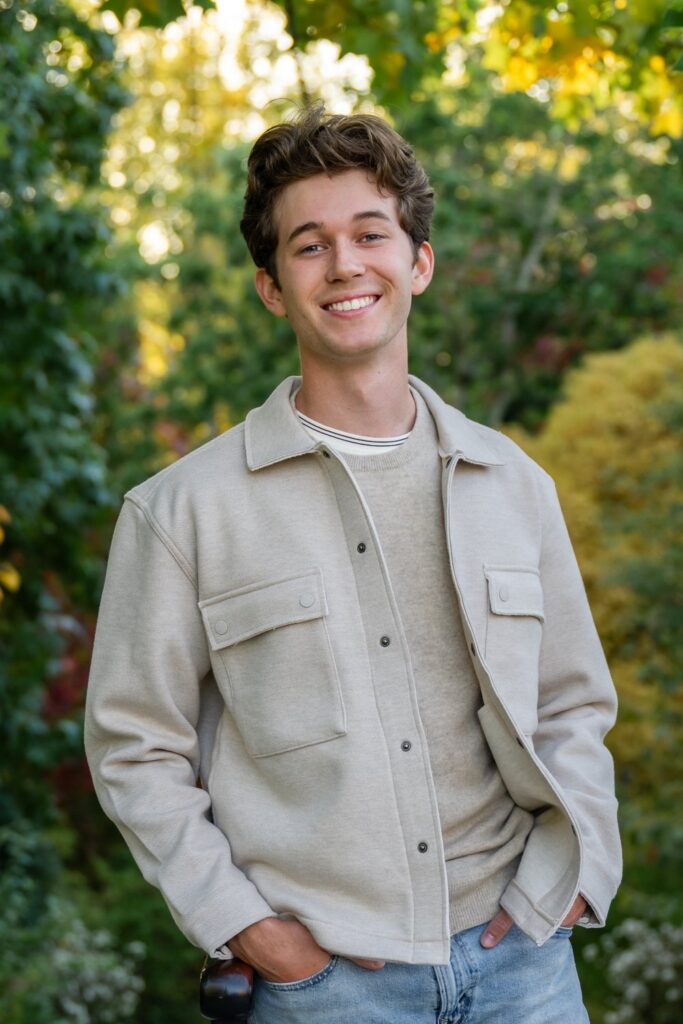 high school senior guy at belleue botanical garden fall