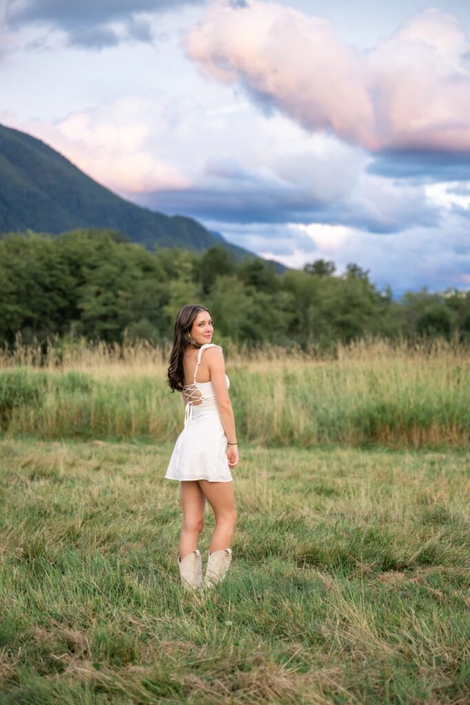 north bend senior girl white dress and cowboy boots