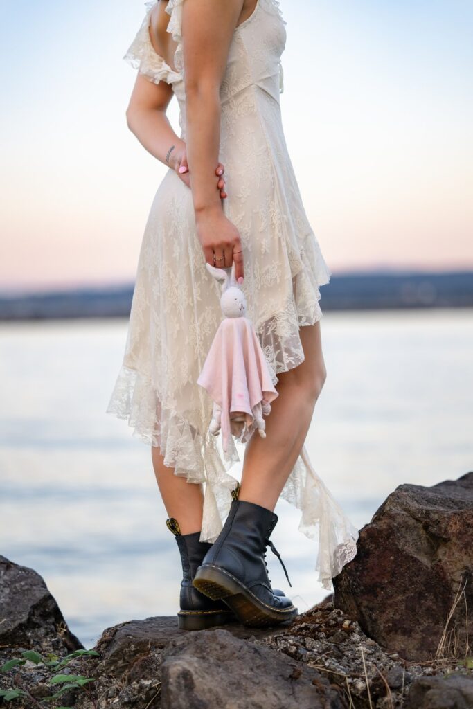 teen girl holding stuffed rabbit