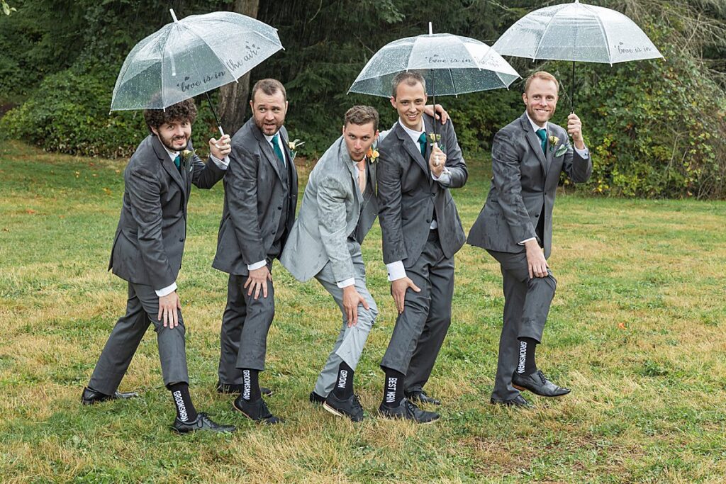 groomsmen rain and umbrellas seattle