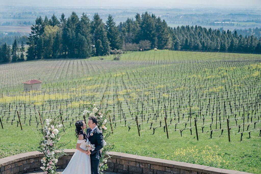 grape vines wedding couple