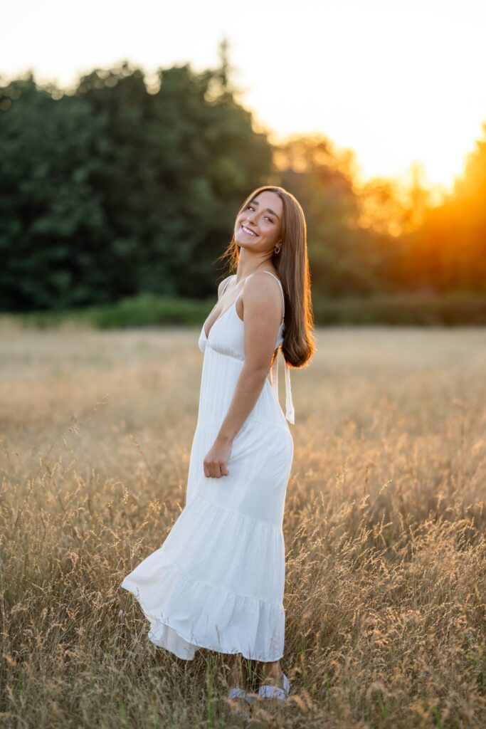open wheat field high school senior long white dress