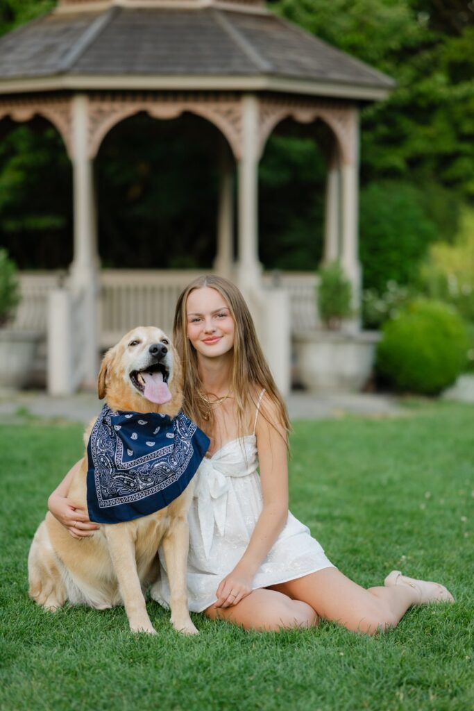 senior girl flower garden with dog