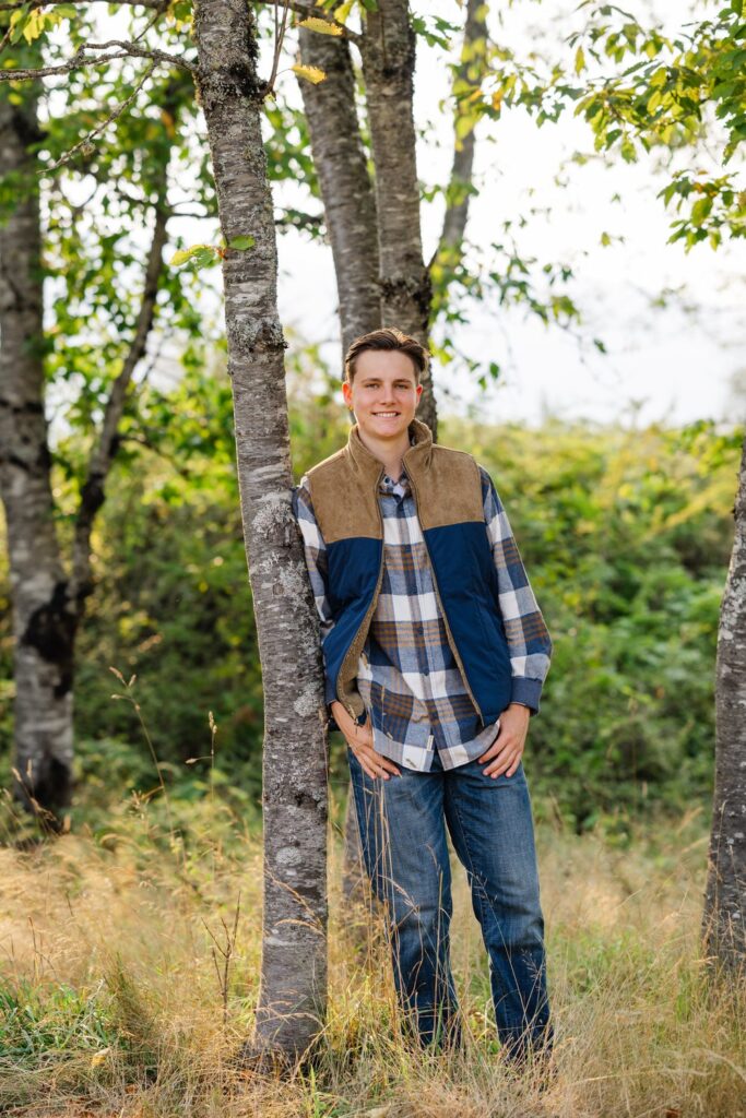 high school senior north bend tall grass and trees