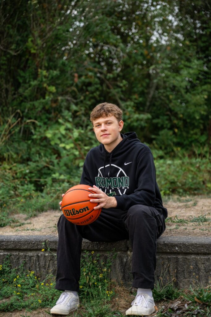 redmond high school senior boy with basketball