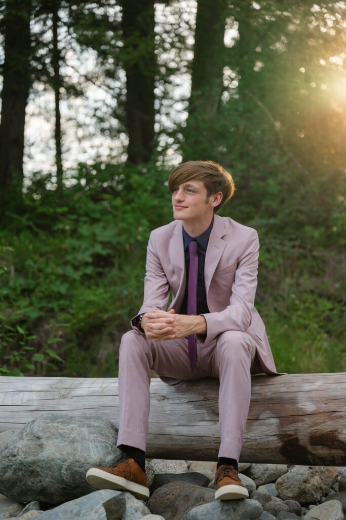 high school senior guy in suit at river park north bend