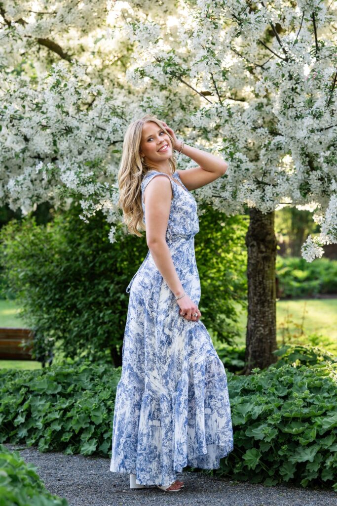 kirkland heritage park spring blossoms high school senior in blue long dress
