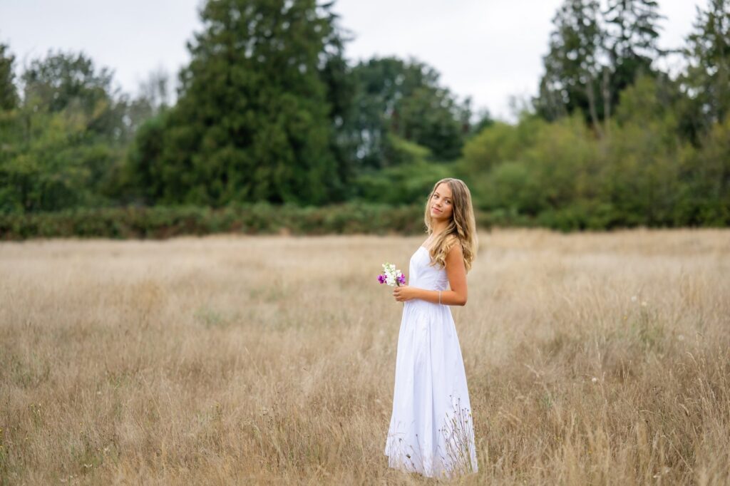 discovery park seattle open field girl in white dress